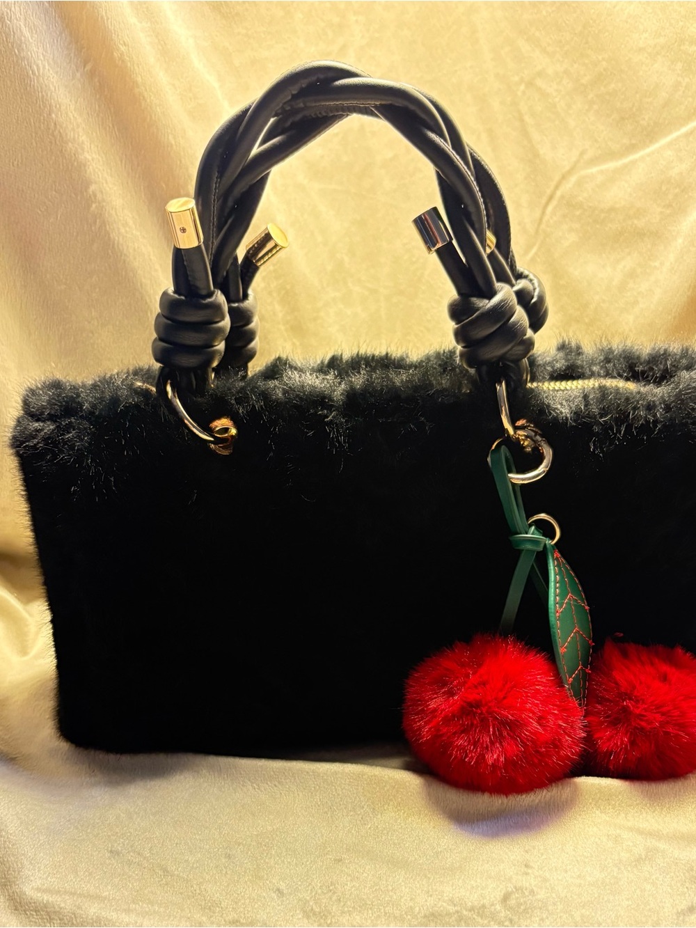 Aldo Black Faux-Fur Satchel with Red Pom-Pom Charm